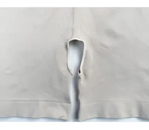Macro view of the seamless breathable fabric and open crotch design of the shapewear