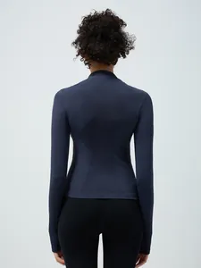 Navy blue seamless yoga jacket with thumb holes and ergonomic back stitching detail