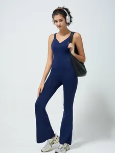Dark blue yoga jumpsuit with V-neck, padded chest and flare leg for fitness workout
