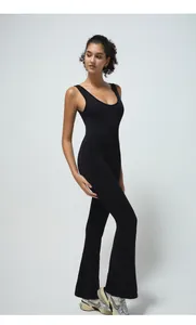 Close-up of black U-neck flared bodysuit with high-stretch athletic fabric detail