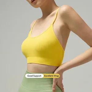 Seamless yellow sports bra and green high-waist leggings set with ribbed texture