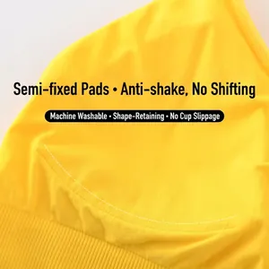 Yellow sports bra featuring semi-fixed pads and a seamless ribbed band for yoga