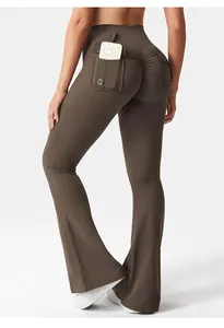 Detail of high waist brown flare yoga pants with cargo pockets and button accents