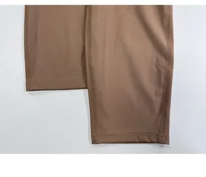 Close-up of reinforced double-needle stitching on high-elasticity yoga cargo pants
