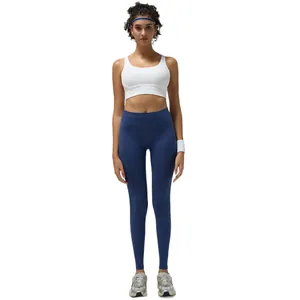 Women's white sports bra and dark blue high waist seamless yoga leggings set