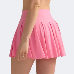 High-waisted pink pleated tennis skirt with elastic fabric for fitness and sports
