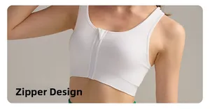 Dettaglio del reggiseno sportivo bianco con cerniera frontale e spalline larghe