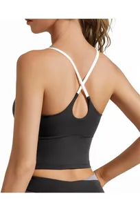 Detail of cross-back white thin straps on black high-impact sports bra for women