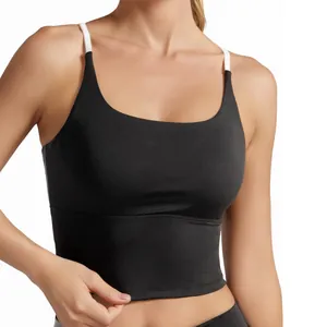 Women black high-impact sports bra with thin white straps and crisscross back design