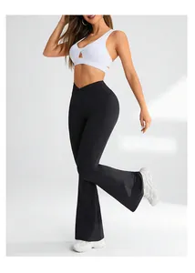 Detail showing the stylish V-shaped high waist and flared leg of black yoga pants