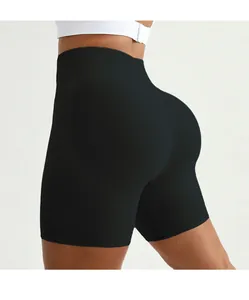 Detail of high-waist plus size black yoga shorts with seamless compression and butt lift