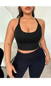 Detail of black sports bra and leggings set with jacquard pattern and ribbed waistband