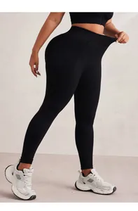 Detailed view of high waist yoga pants showing high elasticity and seamless ribbed texture