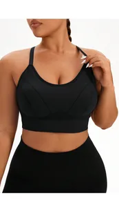 Close-up of black criss-cross yoga sports bra with high-impact support and seamless finish