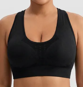 Close-up of black sports bra featuring breathable mesh fabric and moisture wicking detail