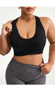Front view of seamless black sports bra and charcoal grey high-waist yoga leggings set