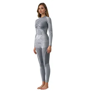 Completo termico grigio da donna con tessuto a compressione ergonomico e traspirante
