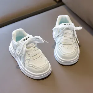 Detailed top view of mint green kids sneakers with breathable toe and MOA logo shoes