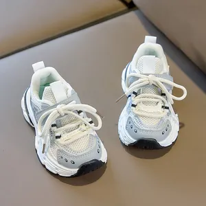 Top down view of children's breathable mesh sneakers with retro thick soles