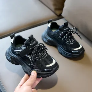 Detail of children sneakers showing breathable mesh upper and secure hook and loop closure