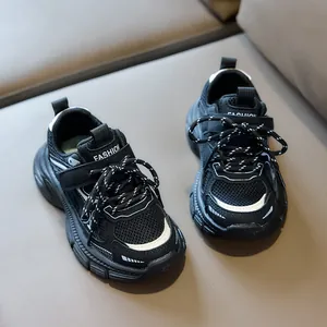 Macro shot of breathable mesh surface and velcro strap on children's dad sneakers