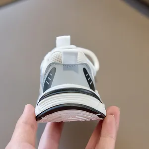 Detail view of the cushioned heel and breathable mesh upper on kids sneakers