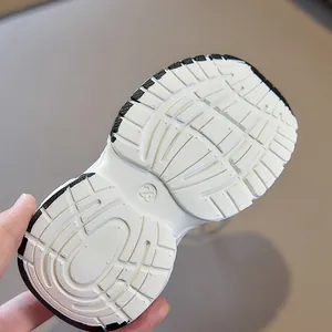 Detail view of anti-slip rubber sole on children's breathable sneakers size 23