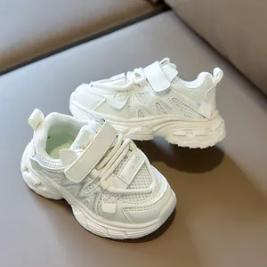 Close-up of children's sports shoes with breathable mesh and hook-and-loop straps