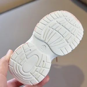 Detail of non-slip rubber sole for toddler sneakers with textured grip pattern