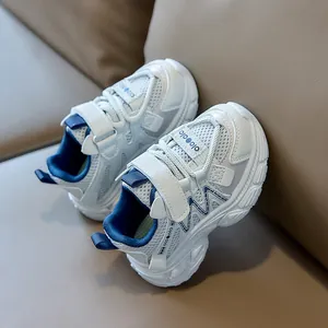 Close-up of breathable mesh fabric and hook-and-loop closure on kids' sneakers