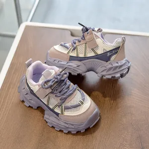 Detail of children's mesh sneakers showing breathable fabric and chunky anti-slip sole