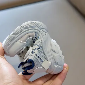 Close-up showing the high flexibility and non-slip sole of breathable kids sports shoes