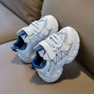 Detailed close-up of kids breathable mesh sports shoes with hook and loop closure