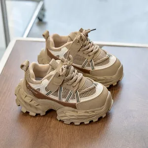 Detailed view of children's chunky sneakers with mesh upper and anti-slip rubber sole