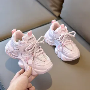 Detailed close-up of pink girls' chunky sneaker with breathable mesh and soft sole