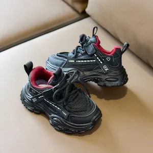 Detailed macro view of kids' sports shoes with breathable mesh and velcro straps