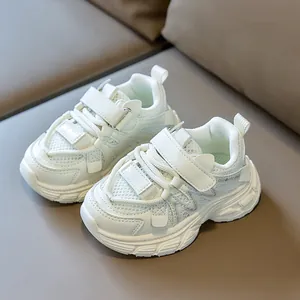 White breathable mesh children sneakers with hook-and-loop closure in retro dad style