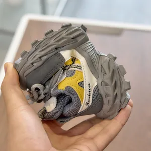 Close-up showing the high flexibility of the mesh sneaker being bent 180 degrees by hand