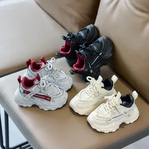 Kids chunky sneakers in black, red, and beige colors with breathable mesh fabric