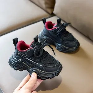 Kids chunky sneakers in black and red mesh with durable thick sole and velcro strap