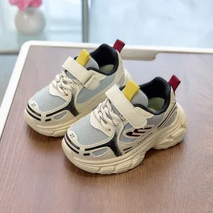 Close-up of children's mesh sneakers featuring breathable fabric and fashion branding