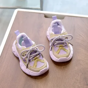 Detailed top view of kids mesh sneakers with lavender and beige leather panels