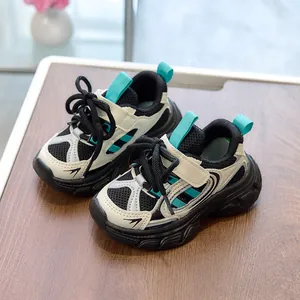 Kids breathable sport sneakers with soft thick sole and blue-black-white patchwork design
