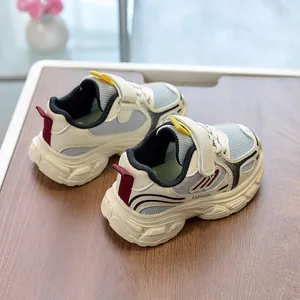 Close-up of children's mesh sneaker with velcro strap and cushioned thick sole details
