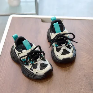 Detailed shot of kids breathable mesh sneakers with soft soles on a wooden tabletop