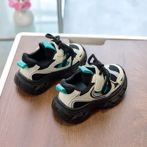 Detail of kids breathable mesh sneakers with non-slip thick soles and colorful patchwork