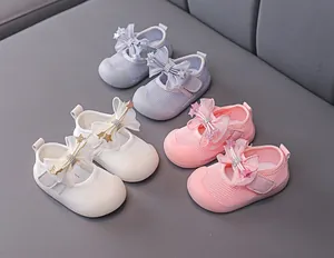 Detailed close-up of breathable mesh baby girl shoes with soft bow and anti-kick toe cap