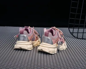 Detail shot of girls retro chunky platform sneaker with pink mesh and silver leather panels