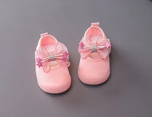 Detailed top view of pink mesh baby walker shoes featuring mesh bow and glitter stars