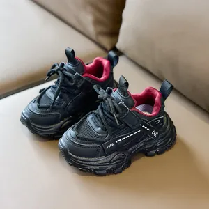 Kids sports sneakers in black and burgundy mesh with durable hook-and-loop straps